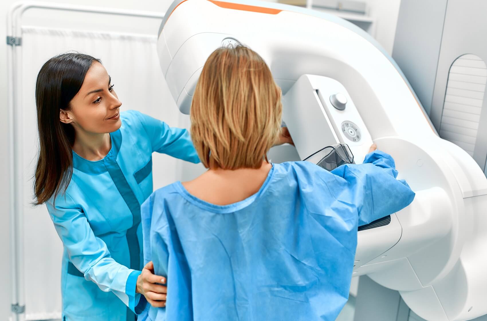 Patient receiving Mammogram Screening